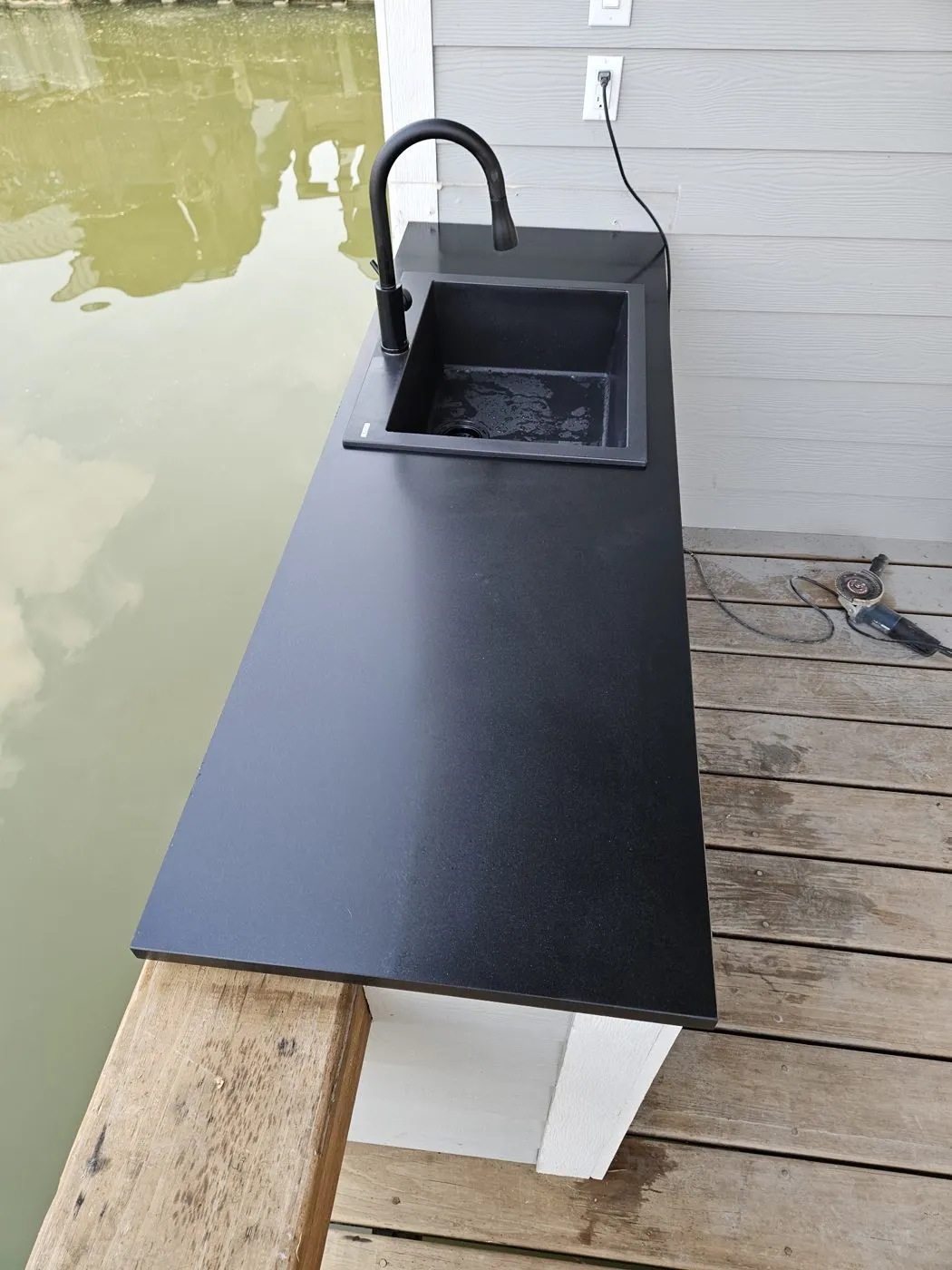 Outdoor sink and counter built on a deck