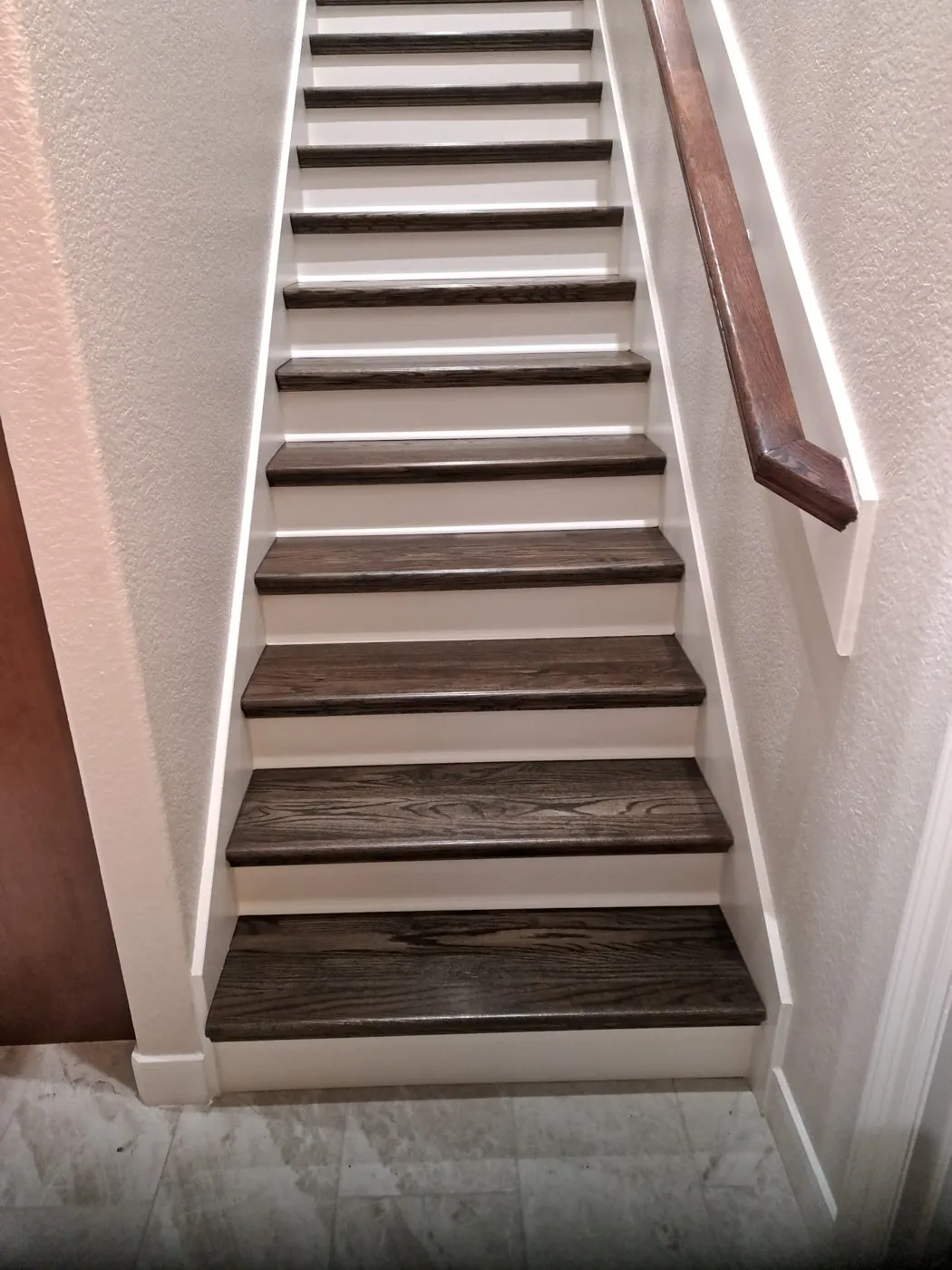 Staircase with new wood treads and white risers